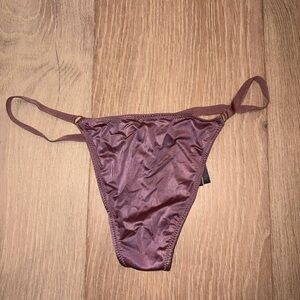 brand new Victoria’s Secret g string, pretty purple medium with tags